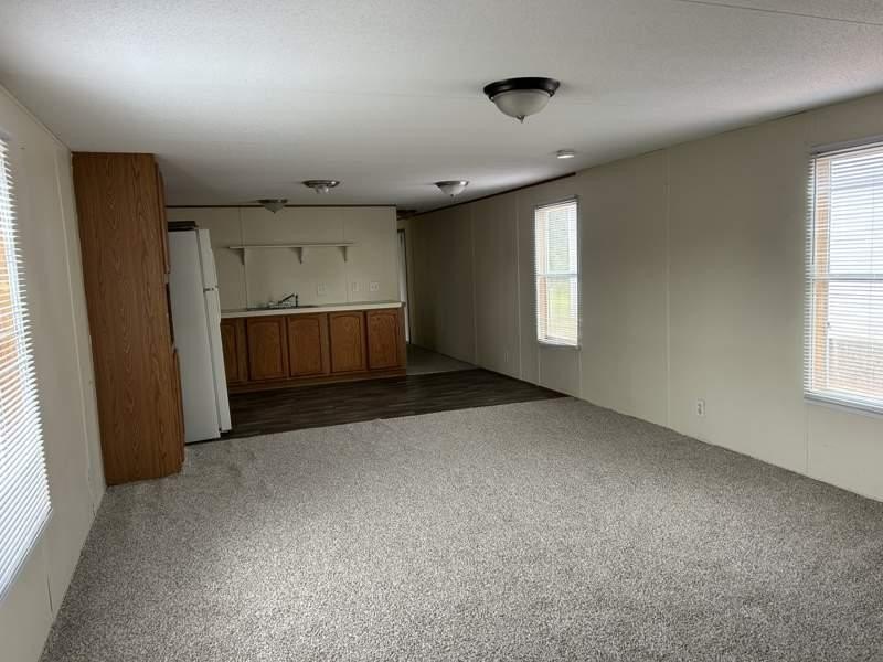 Own your own home in a quiet, well-maintained neighborhood! This - photo 2