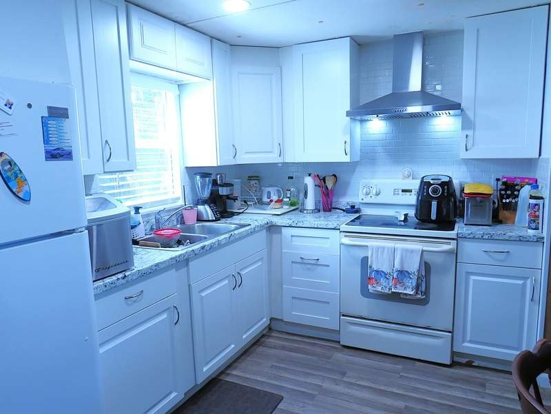 Come and see this affordable 2/2 split plan home today. Kitchen - photo 2