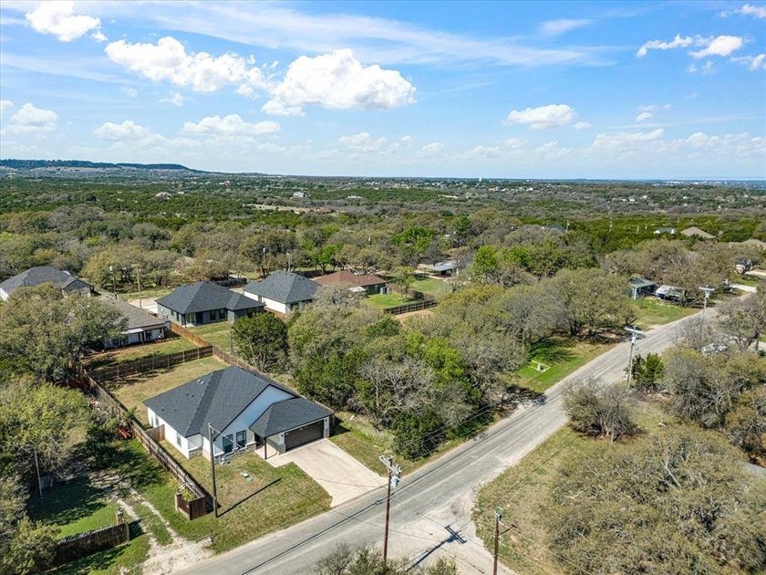 Welcome to this stunning 3 bedroom, 2 bathroom home nestled - photo 2