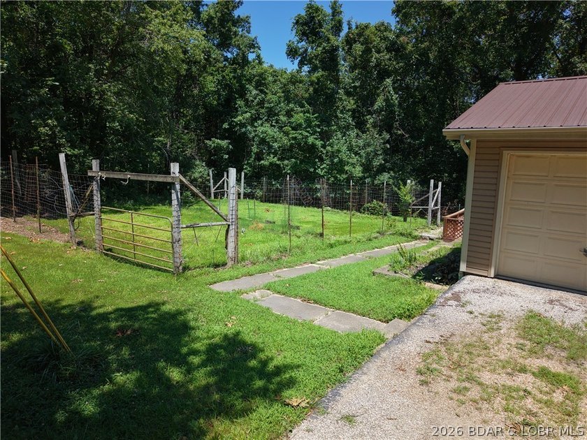 Enjoy the privacy of 31.78 mostly fenced acres just off P Road - photo 12