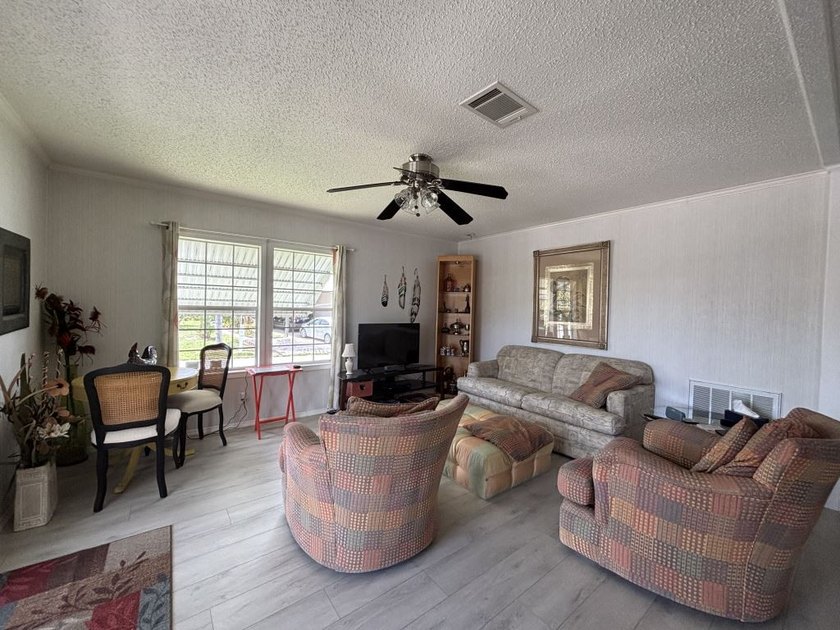Welcome to Palm Lake Estates, a 55+ age-qualified, active, and - photo 3