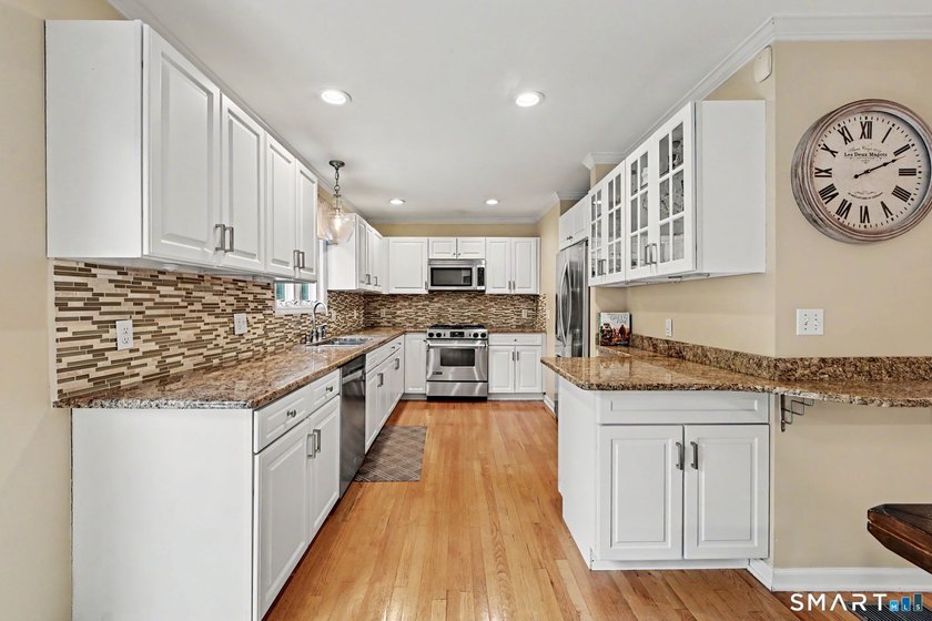 Welcome home to this beautifully updated gem in one of Norwalk's - photo 8