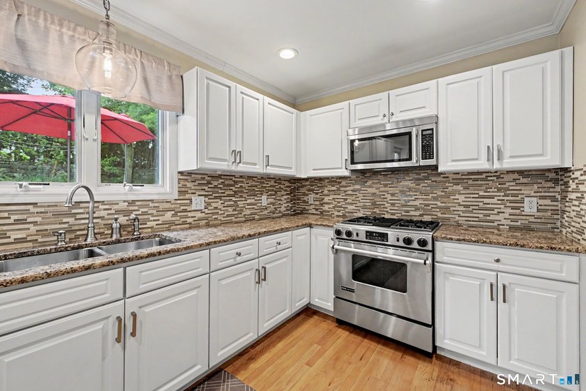 Welcome home to this beautifully updated gem in one of Norwalk's - photo 10