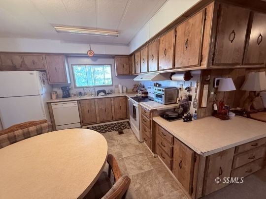 This inviting 1984 manufactured home, set on a permanent - photo 19