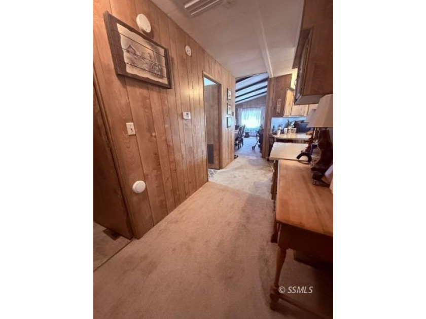 This inviting 1984 manufactured home, set on a permanent - photo 25