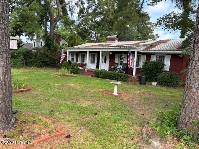 Great three bedroom two bath home with detached garage/workshop - photo 2