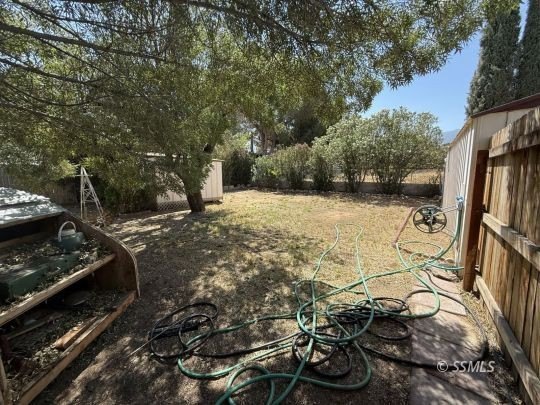 This inviting 1984 manufactured home, set on a permanent - photo 37