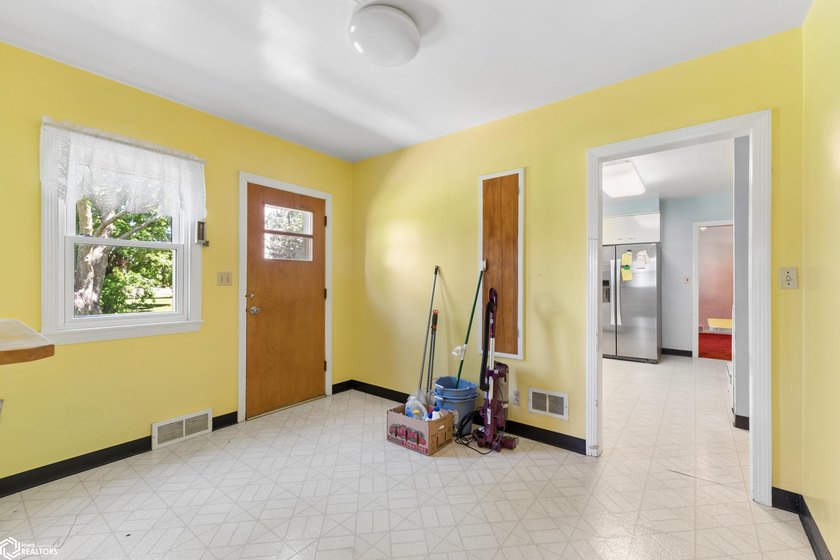 *The Pheasant House on Main* Step into timeless charm with this - photo 12