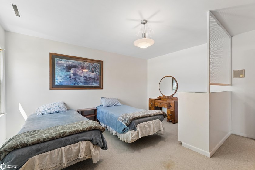 *The Pheasant House on Main* Step into timeless charm with this - photo 23