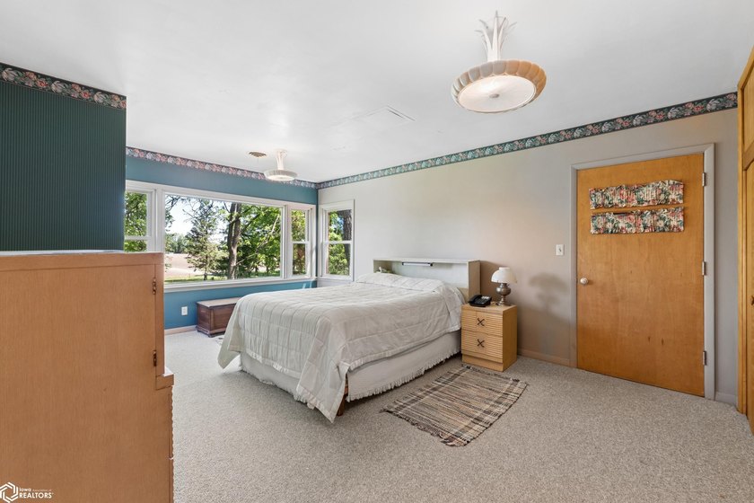 *The Pheasant House on Main* Step into timeless charm with this - photo 25
