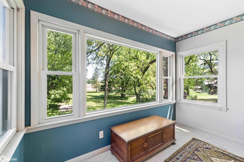 *The Pheasant House on Main* Step into timeless charm with this - photo 27