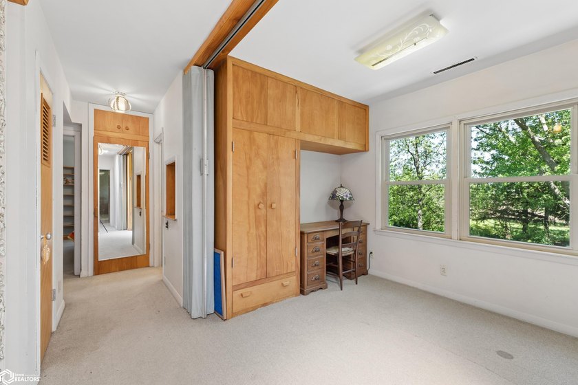 *The Pheasant House on Main* Step into timeless charm with this - photo 28