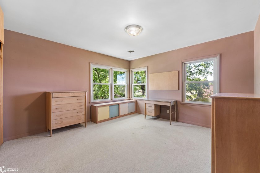 *The Pheasant House on Main* Step into timeless charm with this - photo 33
