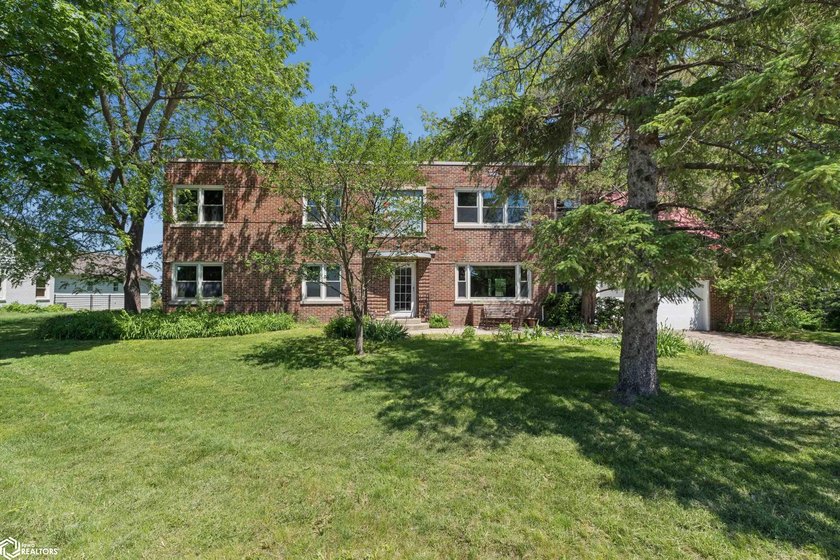 *The Pheasant House on Main* Step into timeless charm with this - photo 41