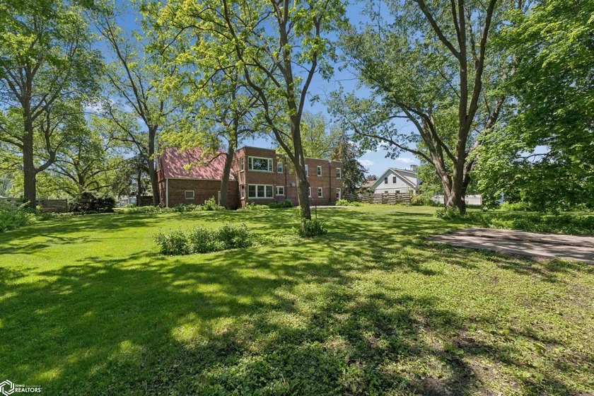 *The Pheasant House on Main* Step into timeless charm with this - photo 48