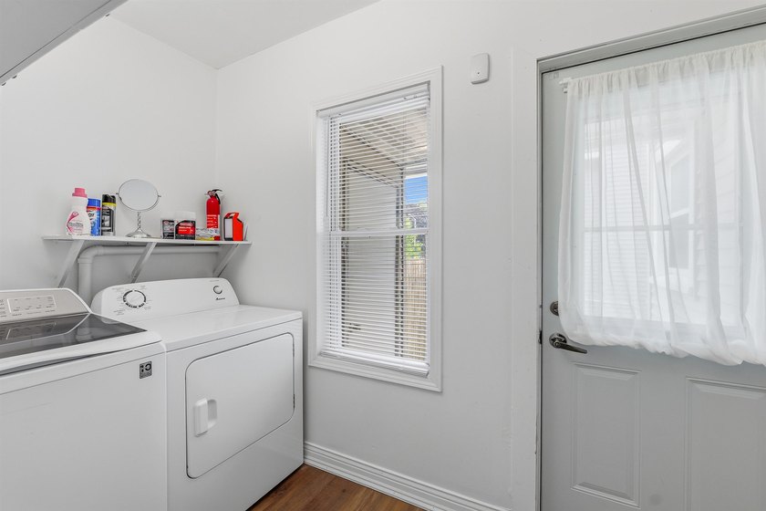 Welcome home to this charming 3-bedroom, 1.5-bath home featuring - photo 12