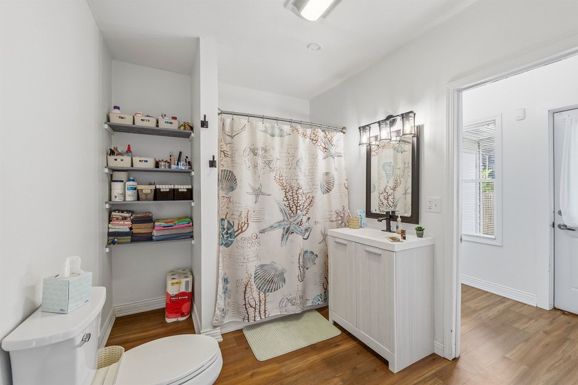Welcome home to this charming 3-bedroom, 1.5-bath home featuring - photo 13