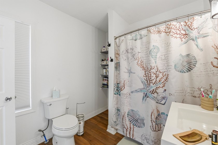 Welcome home to this charming 3-bedroom, 1.5-bath home featuring - photo 14