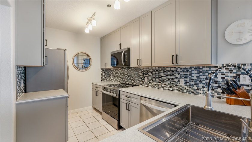 Enjoy stunning, unobstructed waterfront views of the main - photo 5