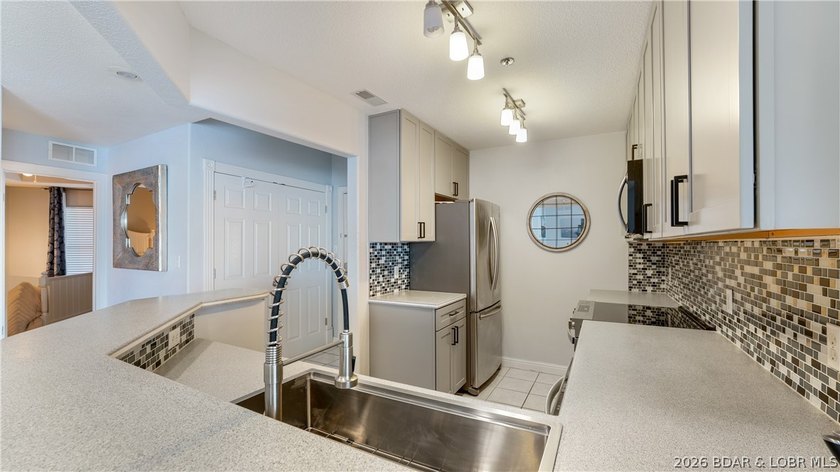 Enjoy stunning, unobstructed waterfront views of the main - photo 8