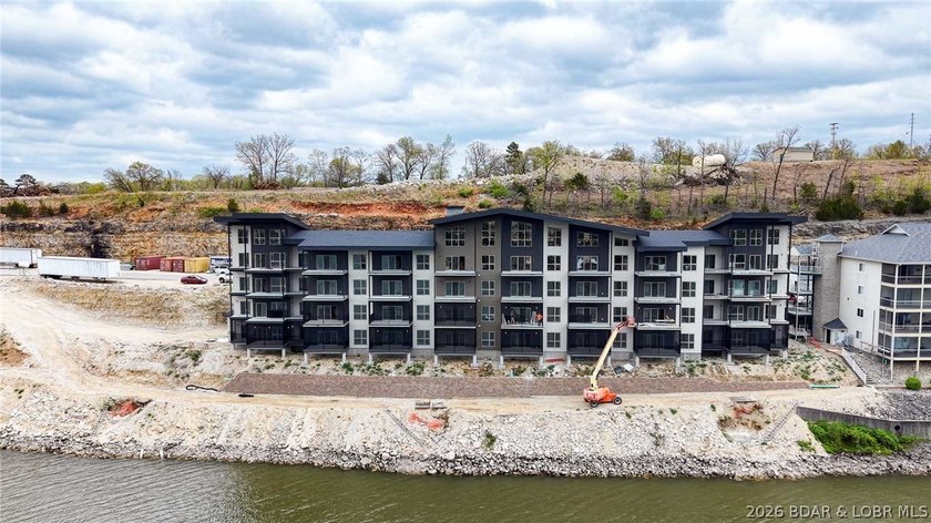 Enjoy the perfect blend of elevation and convenience in this - photo 4