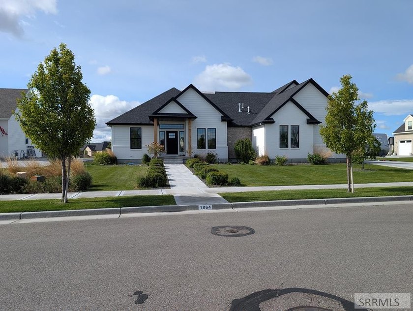 Welcome to 1864 E Beach Park Drive, a beautifully crafted custom - photo 2