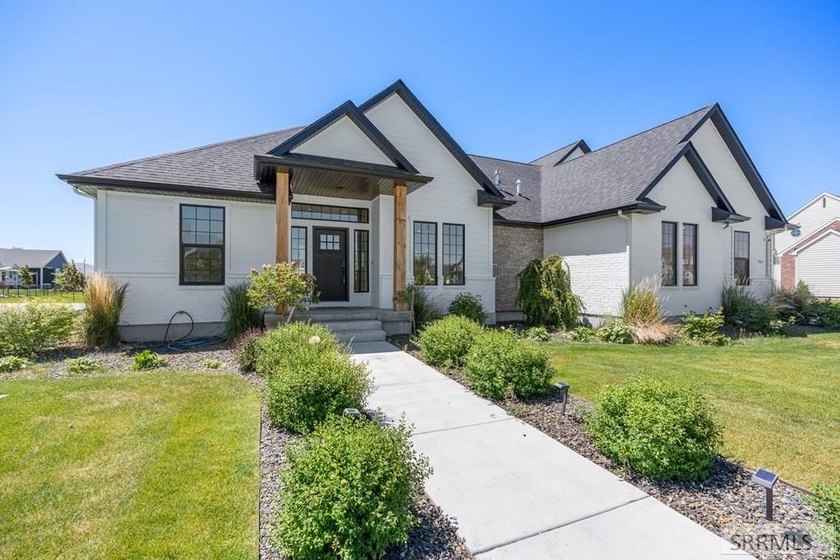 Welcome to 1864 E Beach Park Drive, a beautifully crafted custom - photo 3