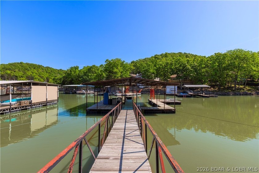 Peaceful lakefront living awaits. Tucked inside a protected - photo 4