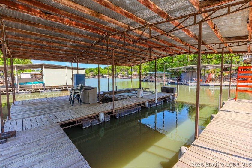 Peaceful lakefront living awaits. Tucked inside a protected - photo 5