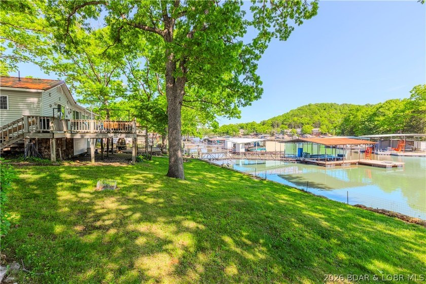 Peaceful lakefront living awaits. Tucked inside a protected - photo 7