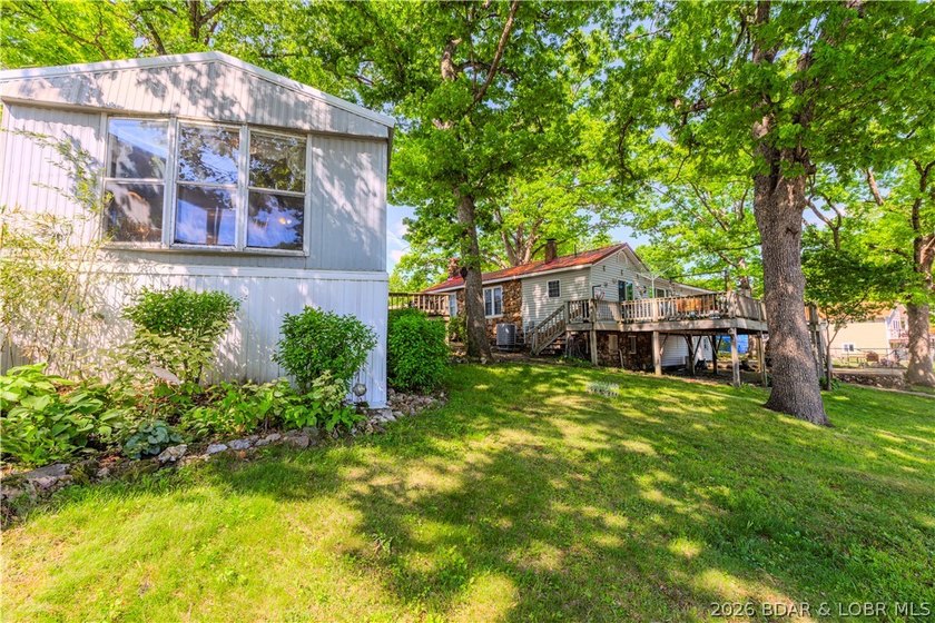 Peaceful lakefront living awaits. Tucked inside a protected - photo 8