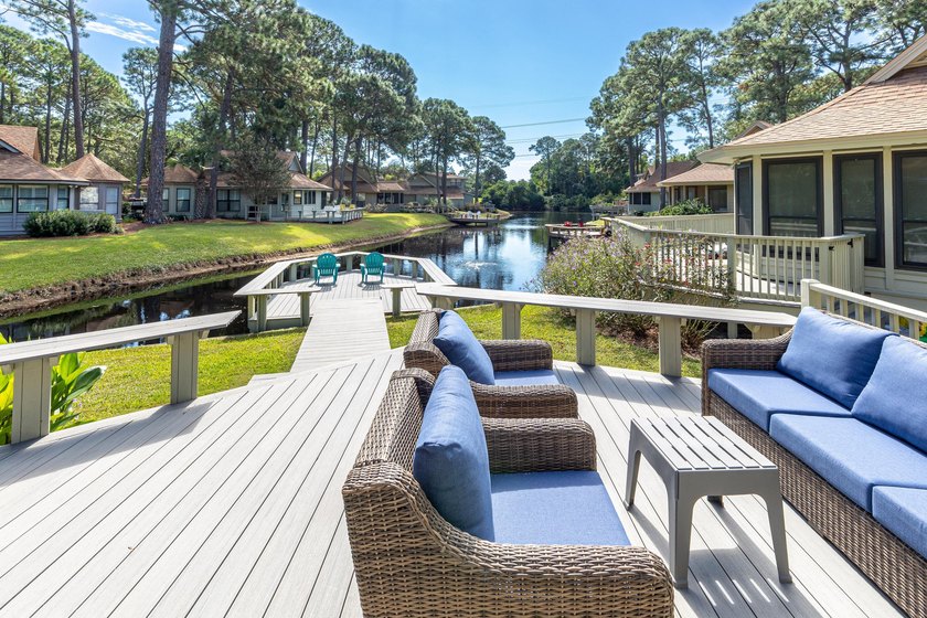 Nestled on the pond in the sought-after Fairways community of - photo 4