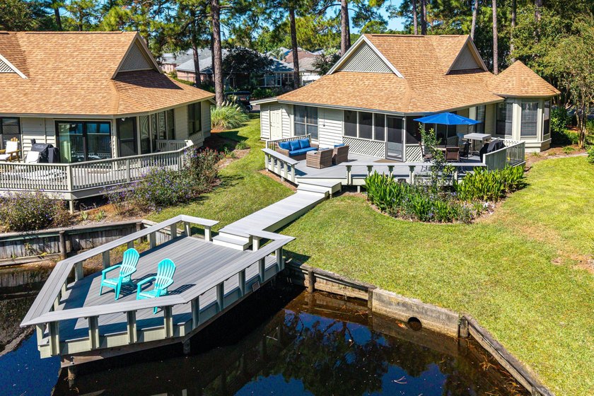 Nestled on the pond in the sought-after Fairways community of - photo 5