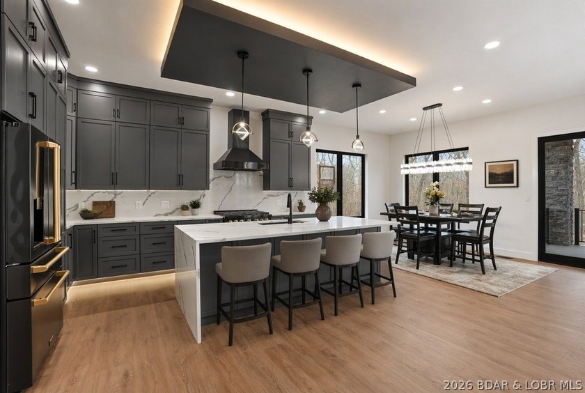 Welcome to your new modern retreat in Porto Cima. This stunning - photo 4