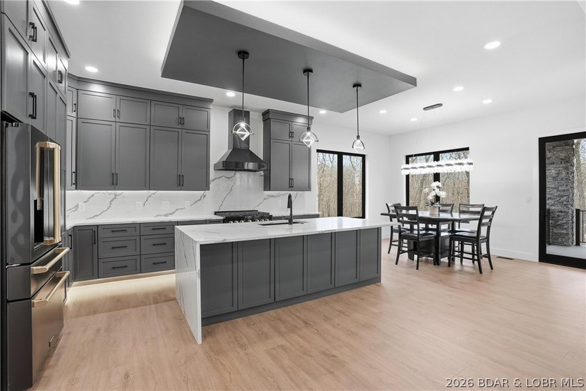 Welcome to your new modern retreat in Porto Cima. This stunning - photo 5