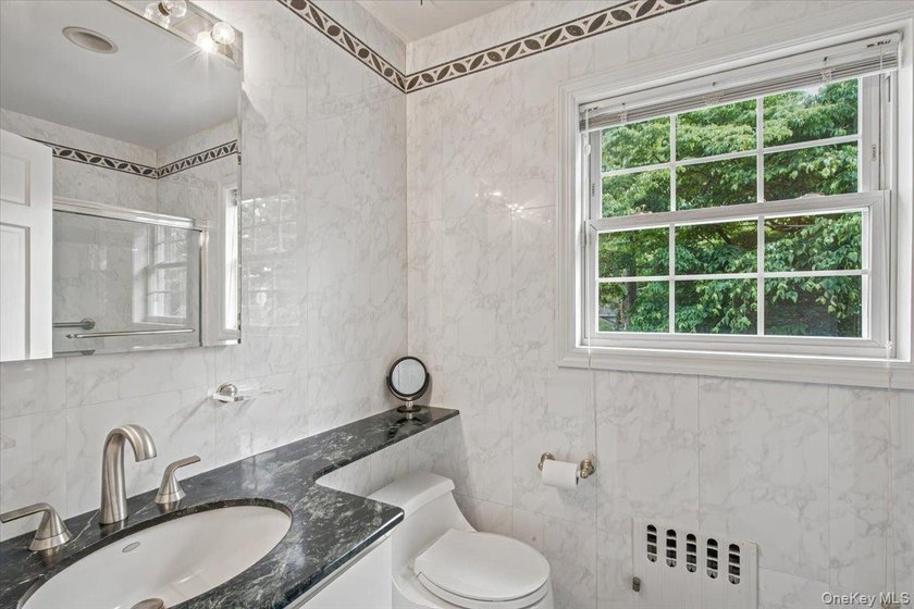 Beautifully landscaped Center Hall Colonial in a most desirable - photo 24