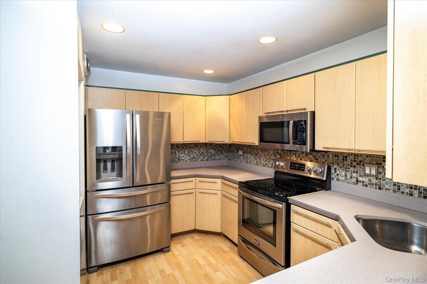 Welcome to resort-style living in the much sought-after gated - photo 12