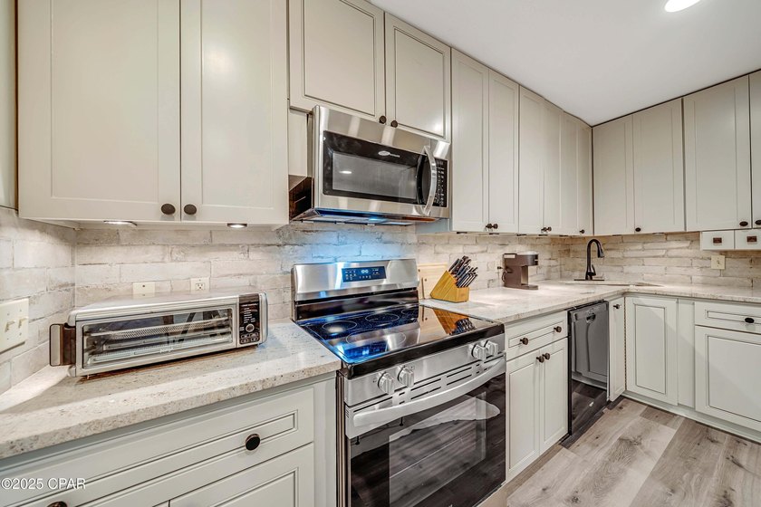 Nobody is above you in this handsome 2nd Story condo with a - photo 2