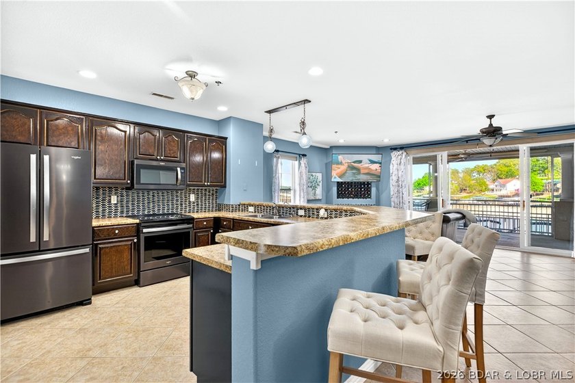 Experience effortless lakefront living at Majestic Pointe, an - photo 9