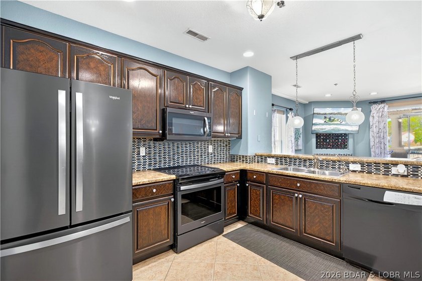Experience effortless lakefront living at Majestic Pointe, an - photo 10