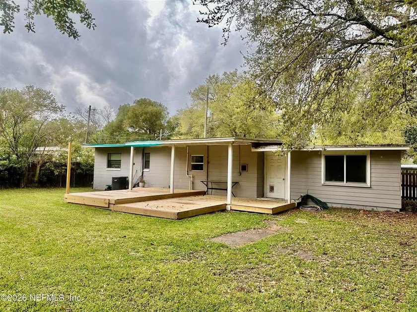 Charming 3BR/1BA concrete block home with major updates and a - photo 5