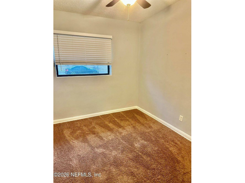Charming 3BR/1BA concrete block home with major updates and a - photo 8