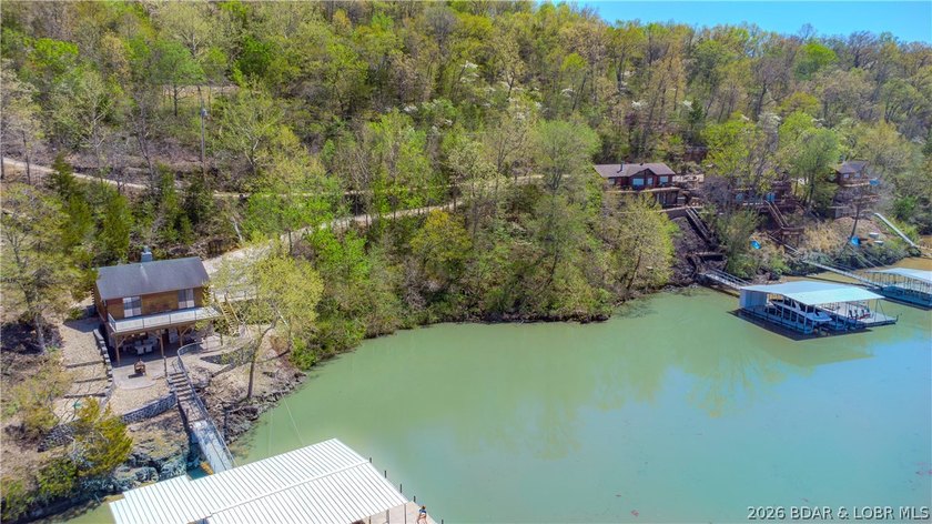 Build your dream lake getaway on this beautiful lakeview lot - photo 7
