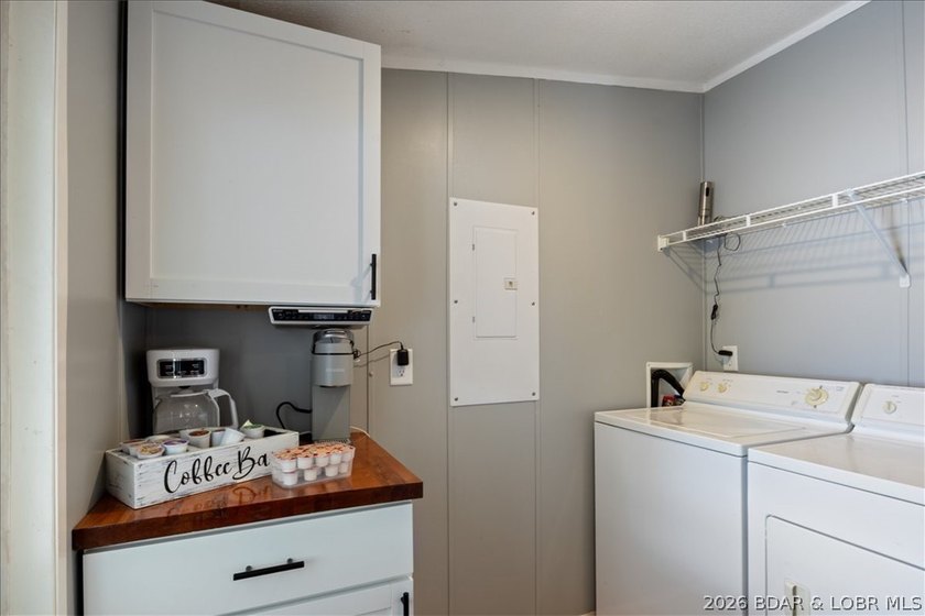 Discover this beautifully updated 4-bedroom, 3-bath lakefront - photo 16