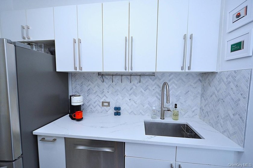 Step into this beautifully renovated 2-bedroom, 2-bath residence - photo 17