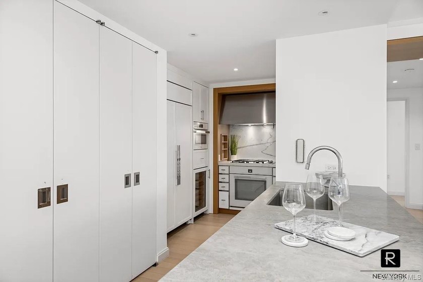 Welcome home to residence 15A at River and Warren. This sun - photo 6