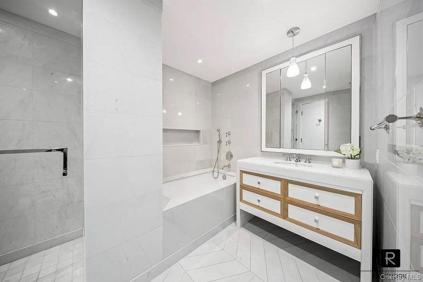 Welcome home to residence 15A at River and Warren. This sun - photo 10
