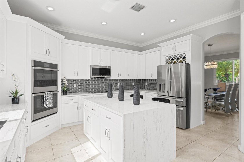 Located in the prestigious Regatta Bay neighborhood of The Isles - photo 14