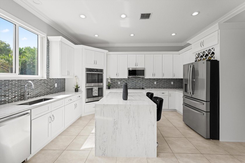 Located in the prestigious Regatta Bay neighborhood of The Isles - photo 15