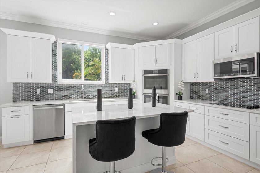 Located in the prestigious Regatta Bay neighborhood of The Isles - photo 16